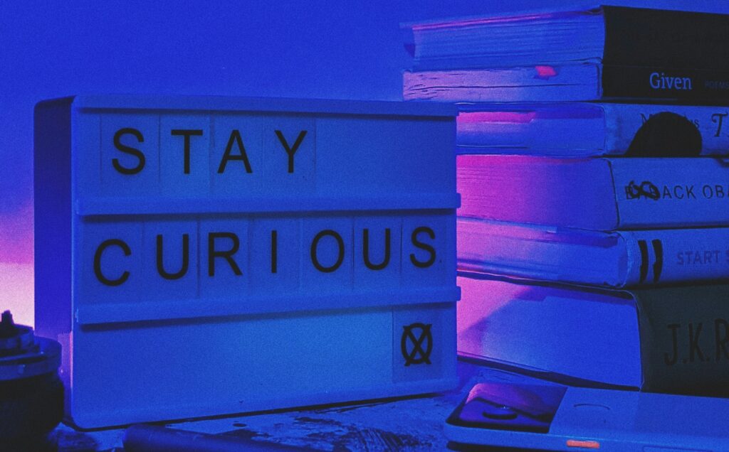 motivational picture with message "stay curious"